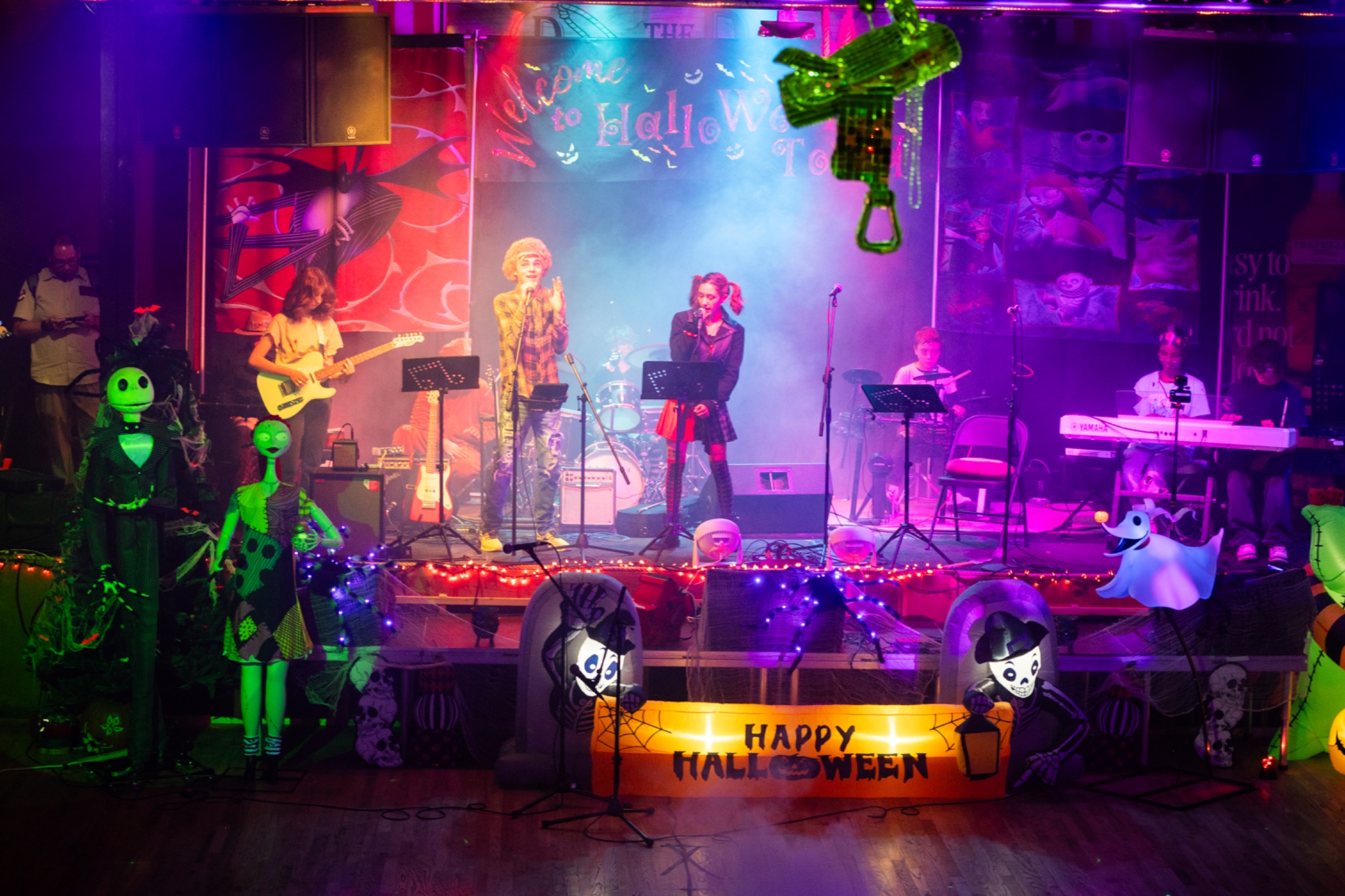 Students performing on stage at Music on the Westside